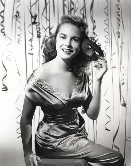 Janet Leigh Posed in White V-Neck Drape SIlk Shoulder Dress with Left Hand Holding the Hair and Right Knee Raised Photo Print - Item # VARCEL690199