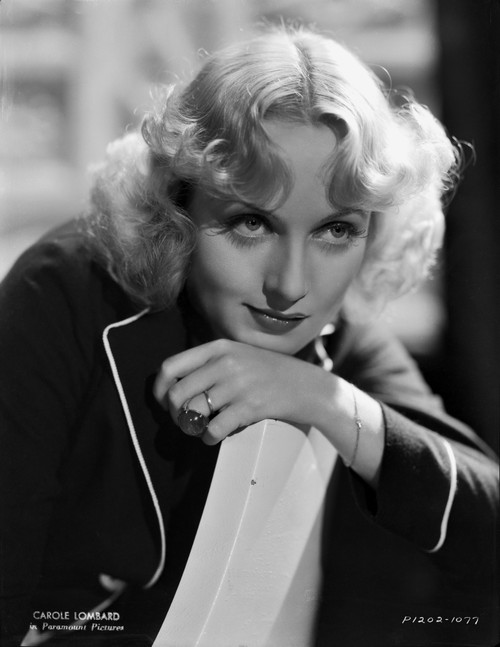 Carole Lombard in a Black Coat and Face Leaning on Hand Photo Print - Item # VARCEL690387