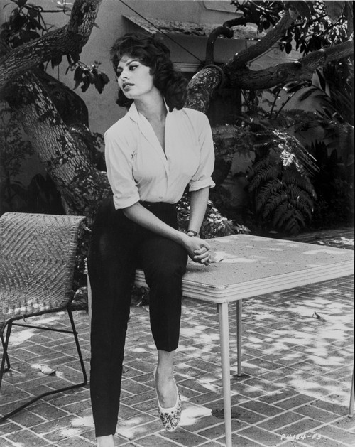 Sophia Loren sitting on a Table in a Classic Portrait Photo Print - Item # VARCEL690478