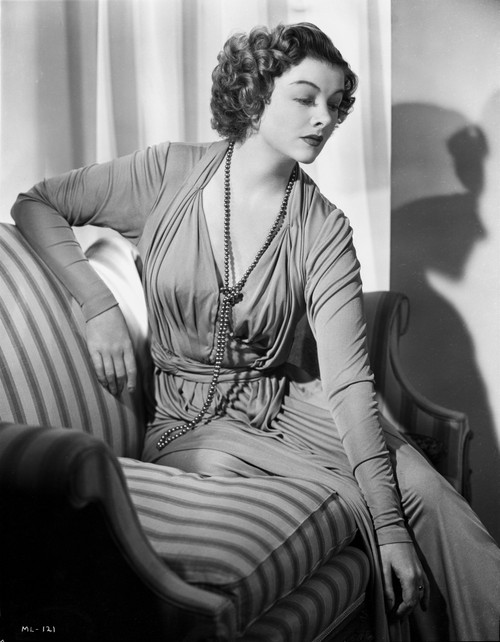 Myrna Loy posed on Couch Photo Print - Item # VARCEL690562