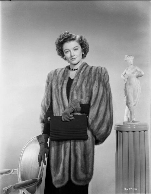 Myrna Loy posed in Furry Coat Photo Print - Item # VARCEL690575