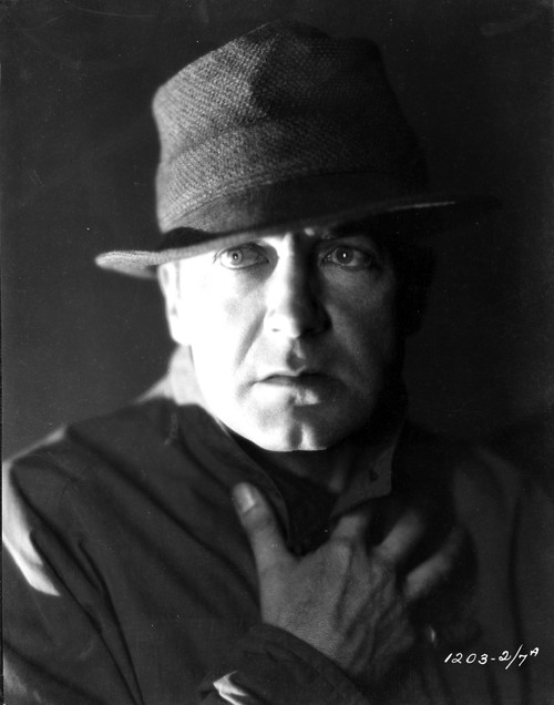 A Clive Brook with his hand on his chest Photo Print - Item # VARCEL690900