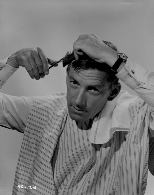 Hoagy Carmichael cutting his hair Photo Print - Item # VARCEL691026