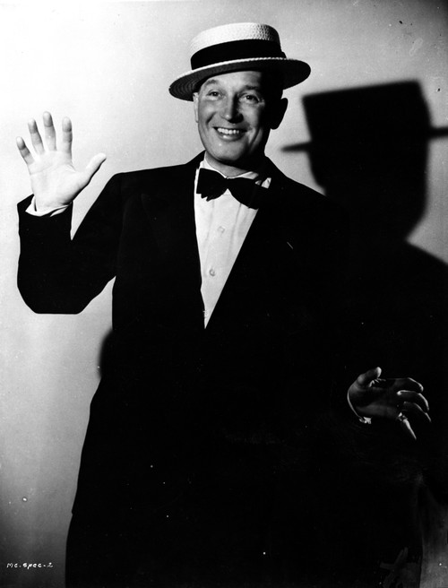 A Maurice Chevalier waving wearing a cheesecutter hat Photo Print - Item # VARCEL691107