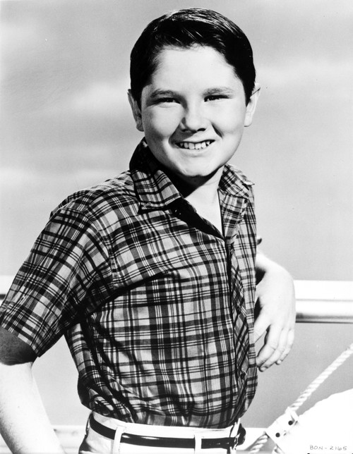 A Kevin Corcoran wearing a plaid shirt Photo Print - Item # VARCEL691234