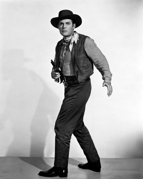 Jon Hall standing in Cowboy Outfit With Pistol Photo Print - Item # VARCEL691911