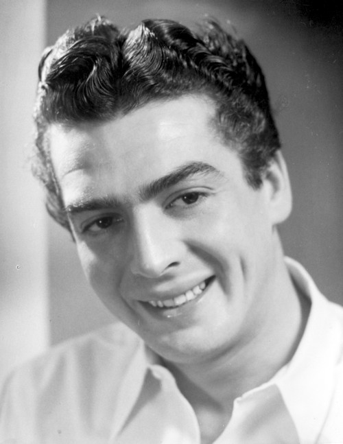 Victor Mature smiling in White Polo Photo Print - Item # VARCEL692579