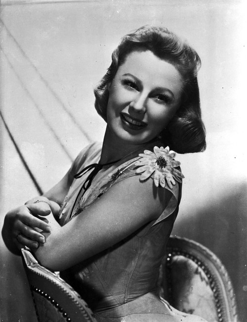 June Allyson Posed on Chair Black and White Photo Print - Item # VARCEL692710