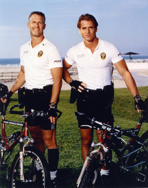 Jim Davidson Posed in White Polo Shirt with Bicycle Photo Print - Item # VARCEL692755