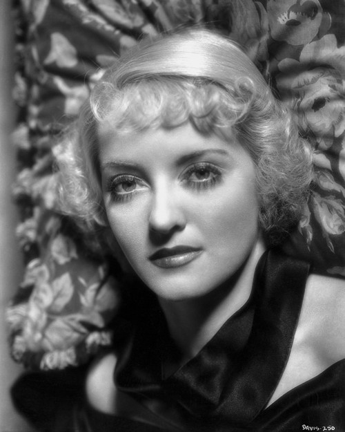 Bette Davis Portrait Highlighted Face in Black Halter Dress with Short Curls on Floral Background Photo Print - Item # VARCEL692850
