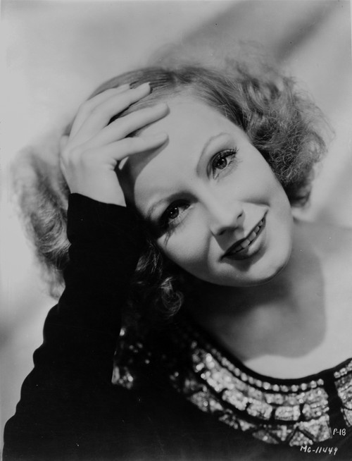 Greta Garbo Posed Hand on Forehead in Black Gown Photo Print - Item # VARCEL692860