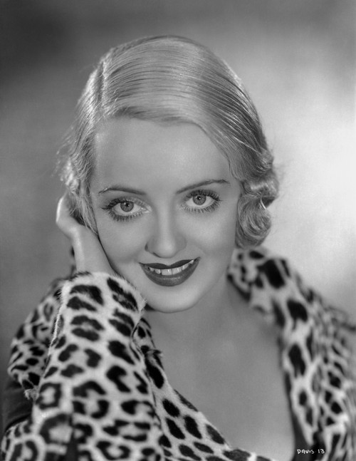Bette Davis Portrait in Black Floral Printed White V-Neck Long Sleeve Dress with Hands on the Ears Photo Print - Item # VARCEL692924