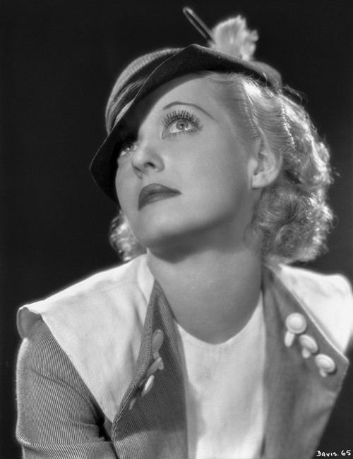Bette Davis Portrait Looking Up in Black Wool Hat and White and Grey Linen Long Sleeve Blouse Photo Print - Item # VARCEL692921