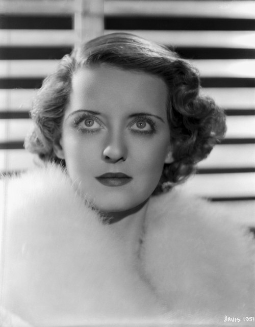 Bette Davis Portrait in White Fur Pelt Coat Looking Up Photo Print - Item # VARCEL692940