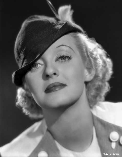 Bette Davis Portrait in Black Wool Hat Chin Up in White Suit Dress Photo Print - Item # VARCEL692958