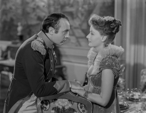 Greta Garbo in a Ruffled Dress Talking to a Man Portrait Photo Print - Item # VARCEL693029
