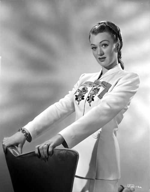 Eve Arden on White Long Sleeve Kneeling on Chair Portrait Photo Print - Item # VARCEL693093