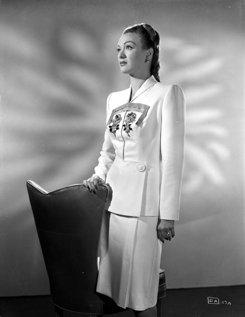 Eve Arden on Long Sleeve Top standing Looking Up Portrait Photo Print - Item # VARCEL693086