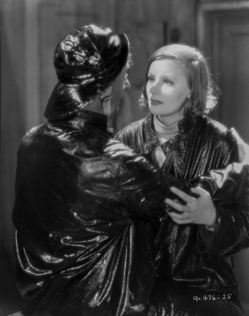 Greta Garbo and a Man wearing Shiny Black Outfit Photo Print - Item # VARCEL693116