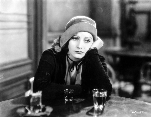 Greta Garbo Leaning and Drinking at the Bar Photo Print - Item # VARCEL693128