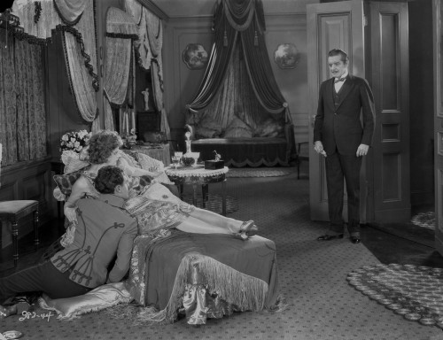 Greta Garbo with a Man Hiding Scene Photo Print - Item # VARCEL693202