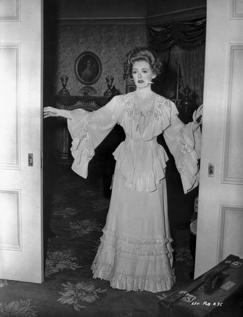 Bette Davis Posed in White Long Sleeve Ruffled Long Dress Photo Print - Item # VARCEL693208