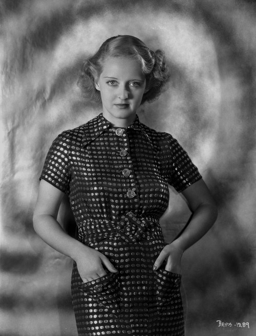Bette Davis Posed Hands on the Pocket in High Neck Short Sleeve Polka Dot Dress Photo Print - Item # VARCEL693228
