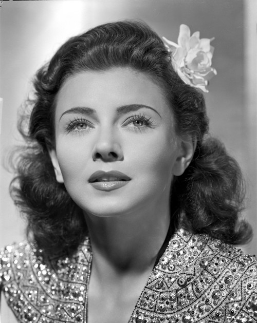 Lenore Aubert on a Dress with Sequin and Flower on Head Photo Print - Item # VARCEL693248
