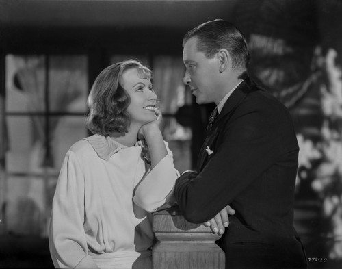 Greta Garbo smiling to a Man Movie Scene Photo Print - Item # VARCEL693269