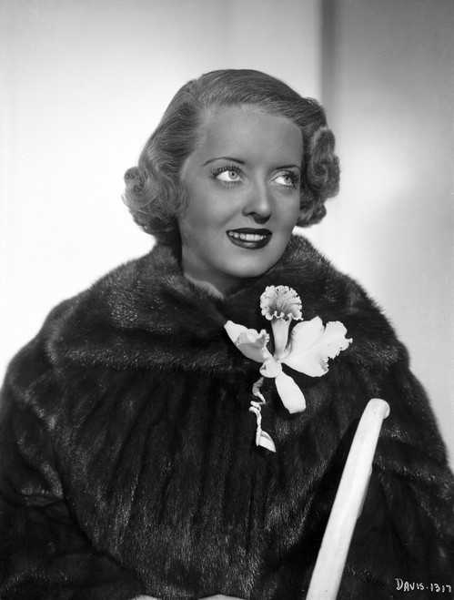 Bette Davis Portrait Eyes Looking Up in Black Fur Coat and White Corsage Photo Print - Item # VARCEL693274