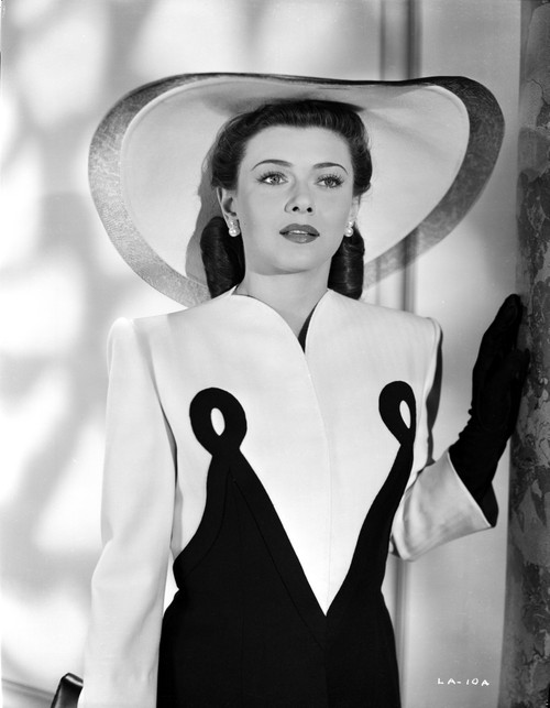 Lenore Aubert on an Elegant Dress With Hat Photo Print - Item # VARCEL693299