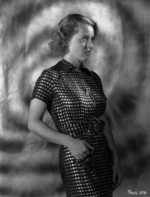 Bette Davis Posed Side View Hand on the Waist in White Polka Dot Black Short Sleeve Dress Photo Print - Item # VARCEL693291