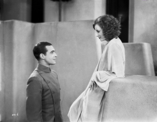 Greta Garbo Man Kneeling In front of Her Photo Print - Item # VARCEL693306