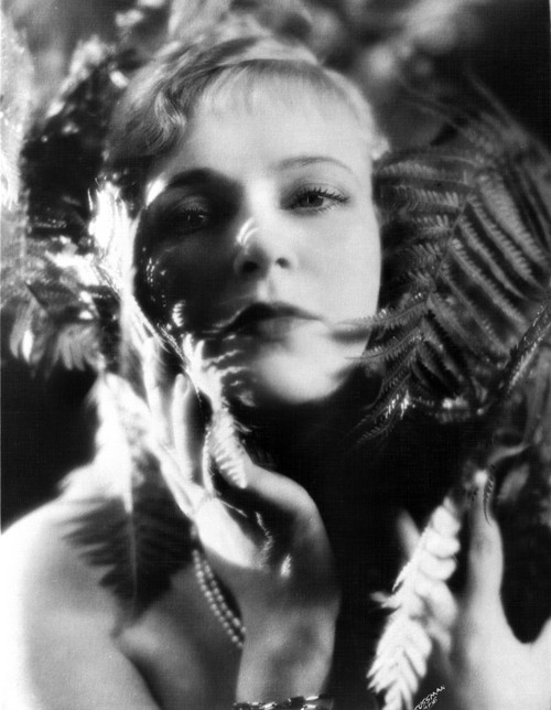 Olga Baclanova on a Close-Up Portrait with Leaves Photo Print - Item # VARCEL693322
