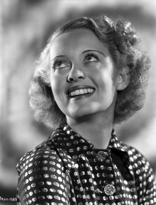 Bette Davis Portrait smiling and Looking Up In Polka Dot Black Dress with Short Curls Photo Print - Item # VARCEL693329