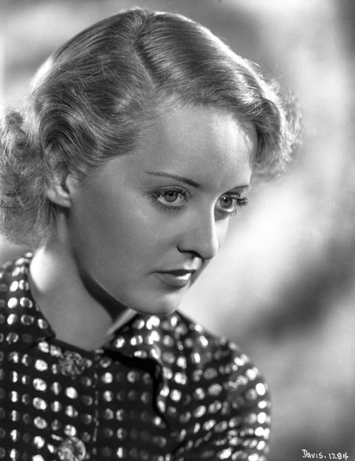 Bette Davis Portrait in Looking Slightly Down in Marcel Wave and Polka Dot Black Shirt Photo Print - Item # VARCEL693345