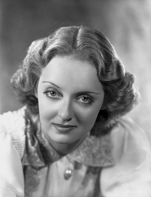 Bette Davis Portrait smiling in White Wool Shirt with Middle Parted Short Curls Photo Print - Item # VARCEL693349