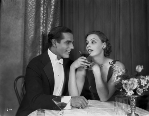 Greta Garbo wearing Black Gown with a Man Photo Print - Item # VARCEL693478