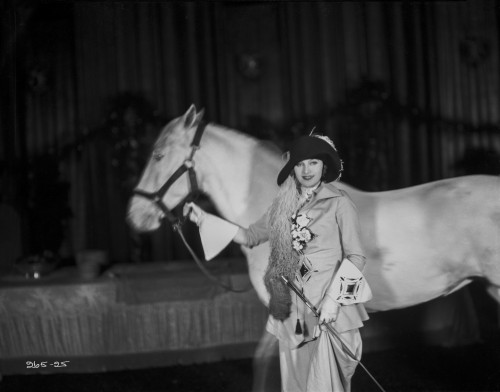 Greta Garbo Holding a White Horse Photo Print - Item # VARCEL693474