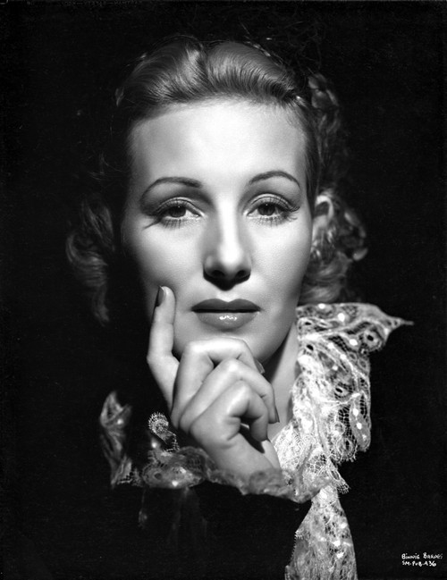 Binnie Barnes on a Lace Collar with Finger on Face Photo Print - Item # VARCEL693663