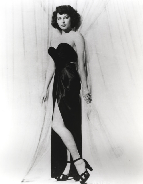 Classic Portrait of Ava Gardner standing in Black Gown with Stiletto Photo Print - Item # VARCEL693674