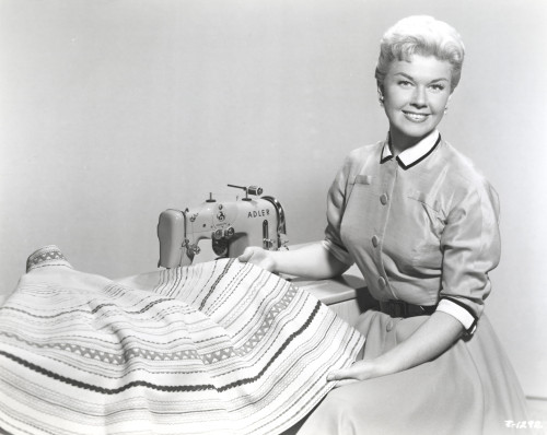 Doris Day Seated in Classic with Sewing Machine Photo Print - Item # VARCEL693684