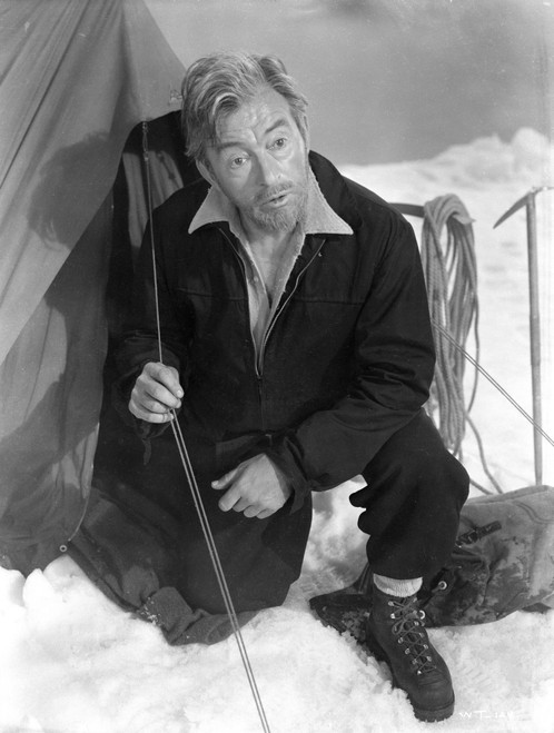 A Publicity Still Of Claude Rains Sitting Next To A Tent Photo Print