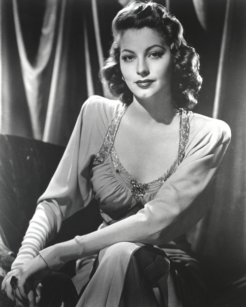 Black and White Portrait of Ava Gardner sitting in Long Dress Photo Print - Item # VARCEL693783