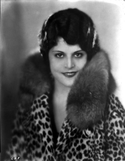 Lena Basquette on a Leopard Top and smiling Photo Print - Item # VARCEL693789