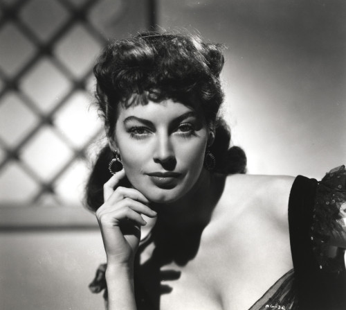 Ava Gardner posed in Black Gown with Hand on Cheeks Photo Print - Item # VARCEL693833