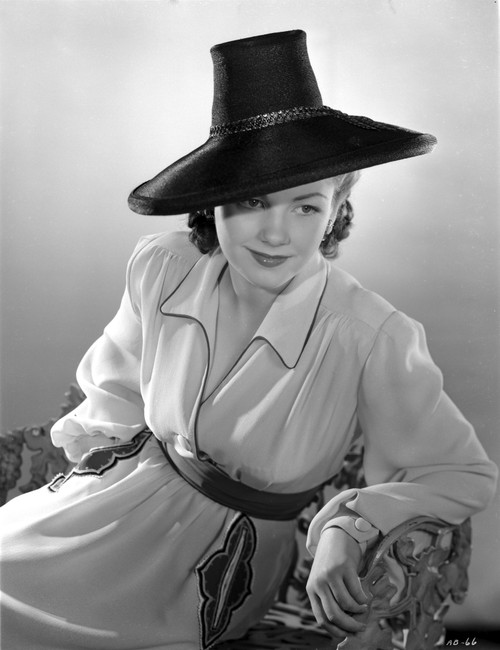 Anne Baxter on a Long Sleeve sitting and Leaning Photo Print - Item # VARCEL693880