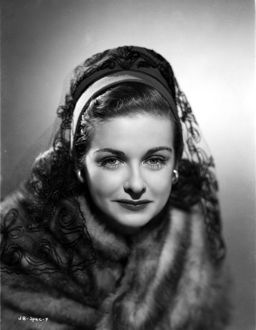 Joan Bennett on a Lace Netted Veil and Slightly smiling Photo Print - Item # VARCEL694043