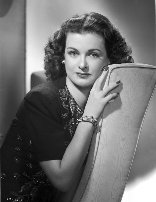 Joan Bennett on a sitting and Leaning Pose Photo Print - Item # VARCEL694071