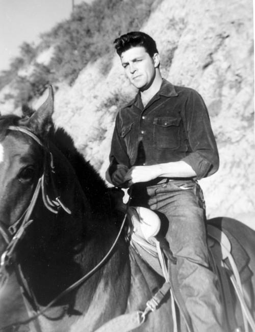 Dale Robertson riding a horse Photo Print - Item # VARCEL694086